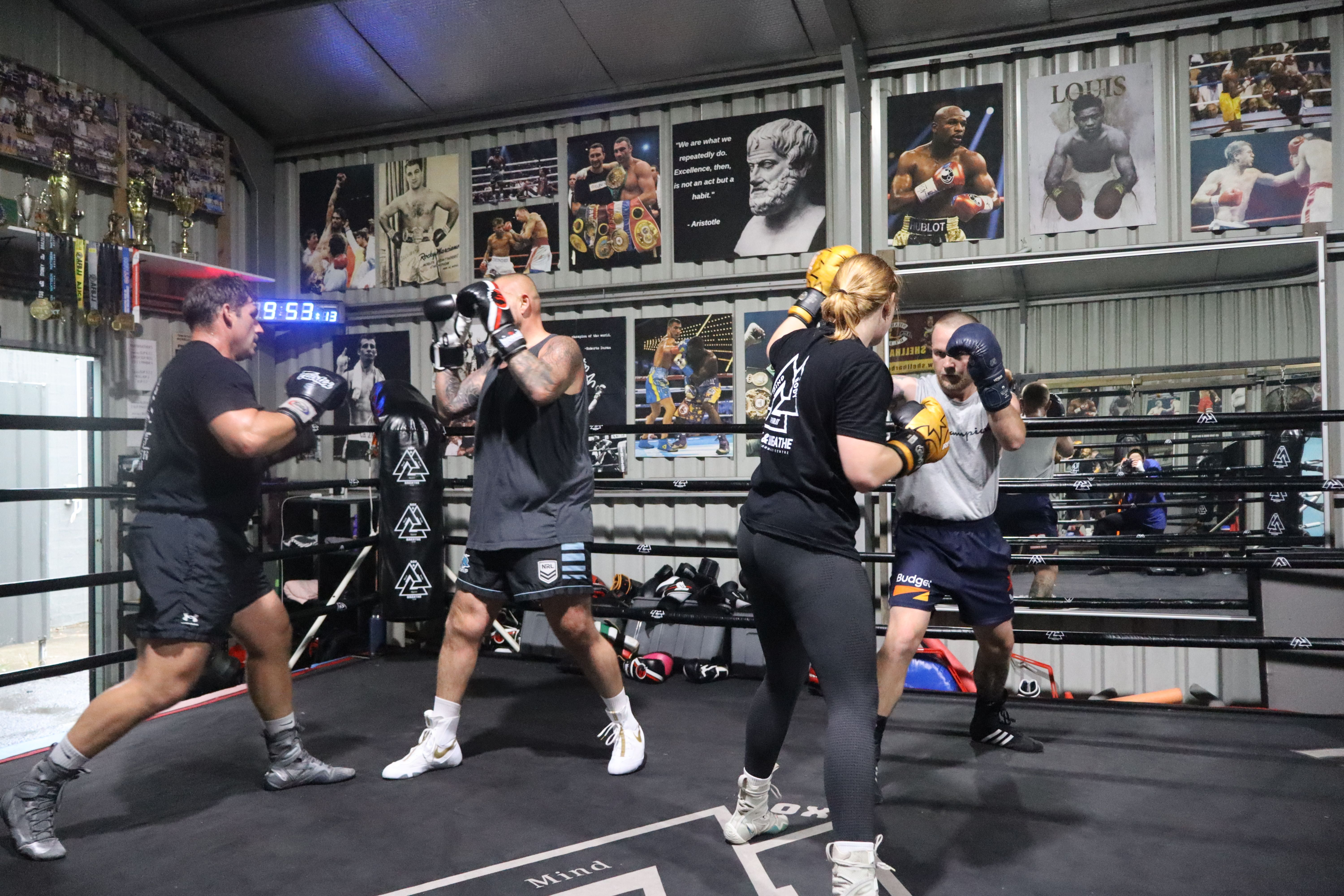 Members drilling combinations in the ring