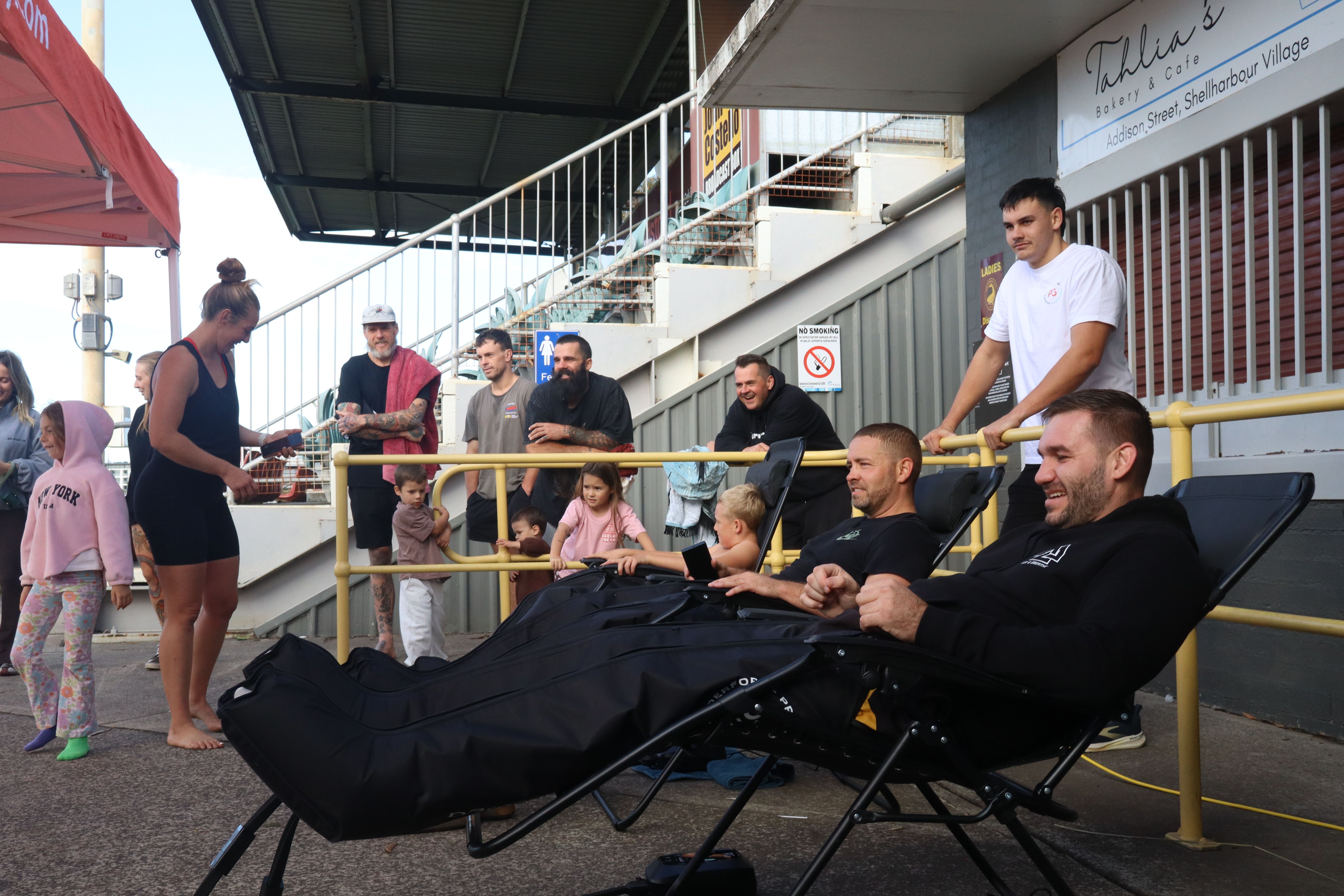 Members and families together at the gym for a recovery session