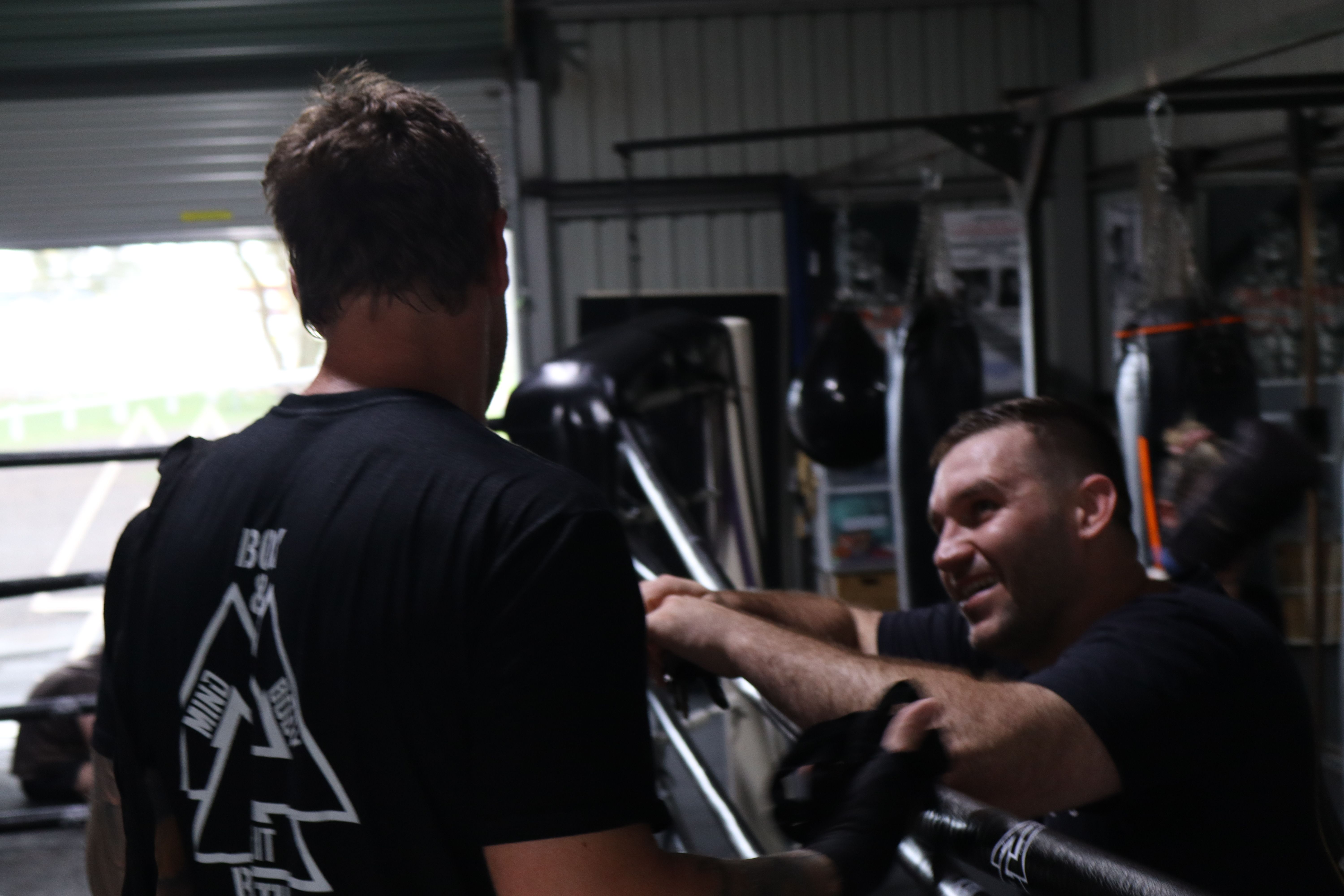 Dan coaching a member at the ring at Box & Breathe