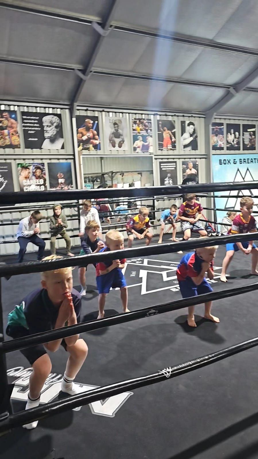 Kids training in the ring at a Box & Breathe class