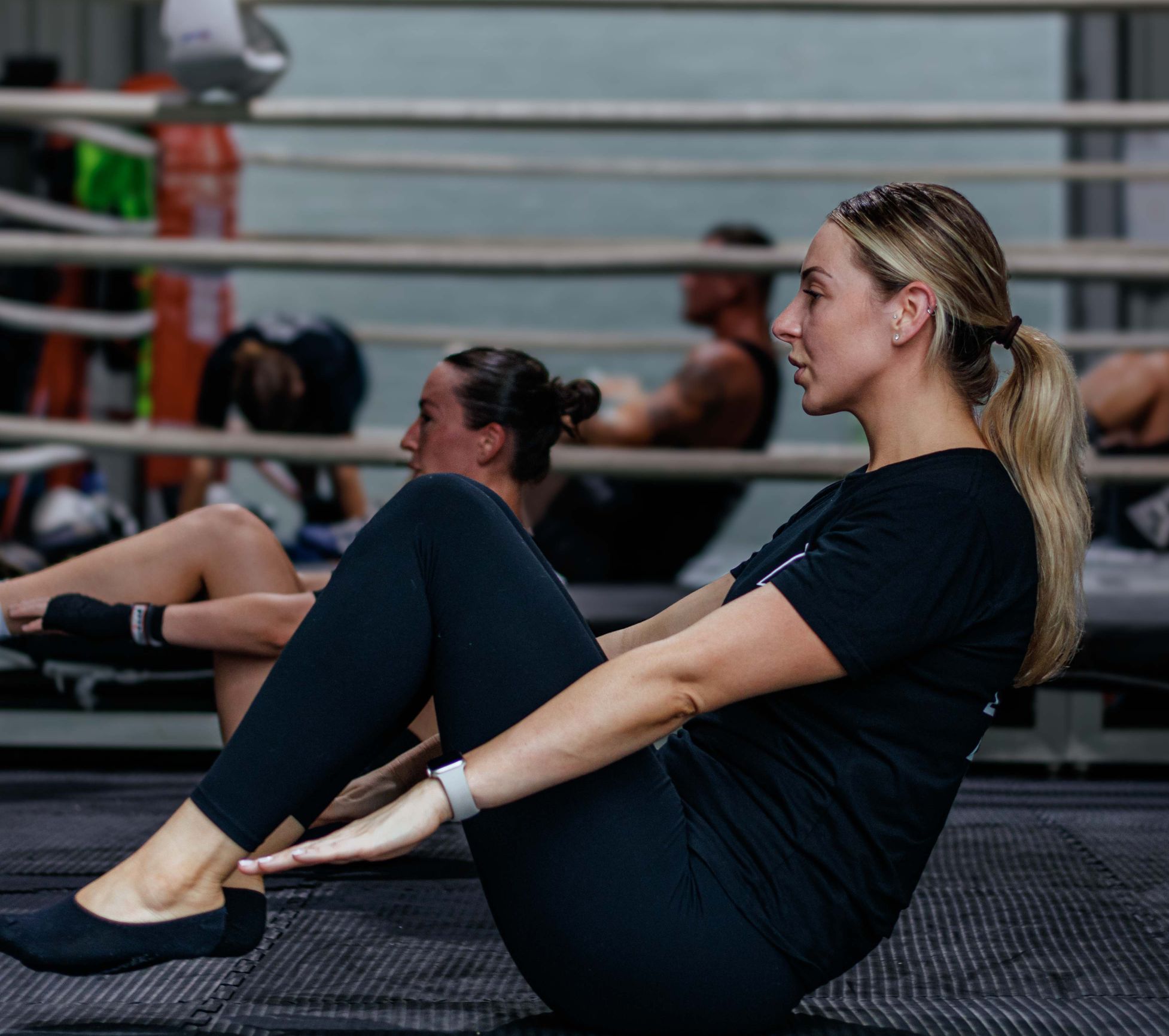 Coach guiding a strength and mobility session